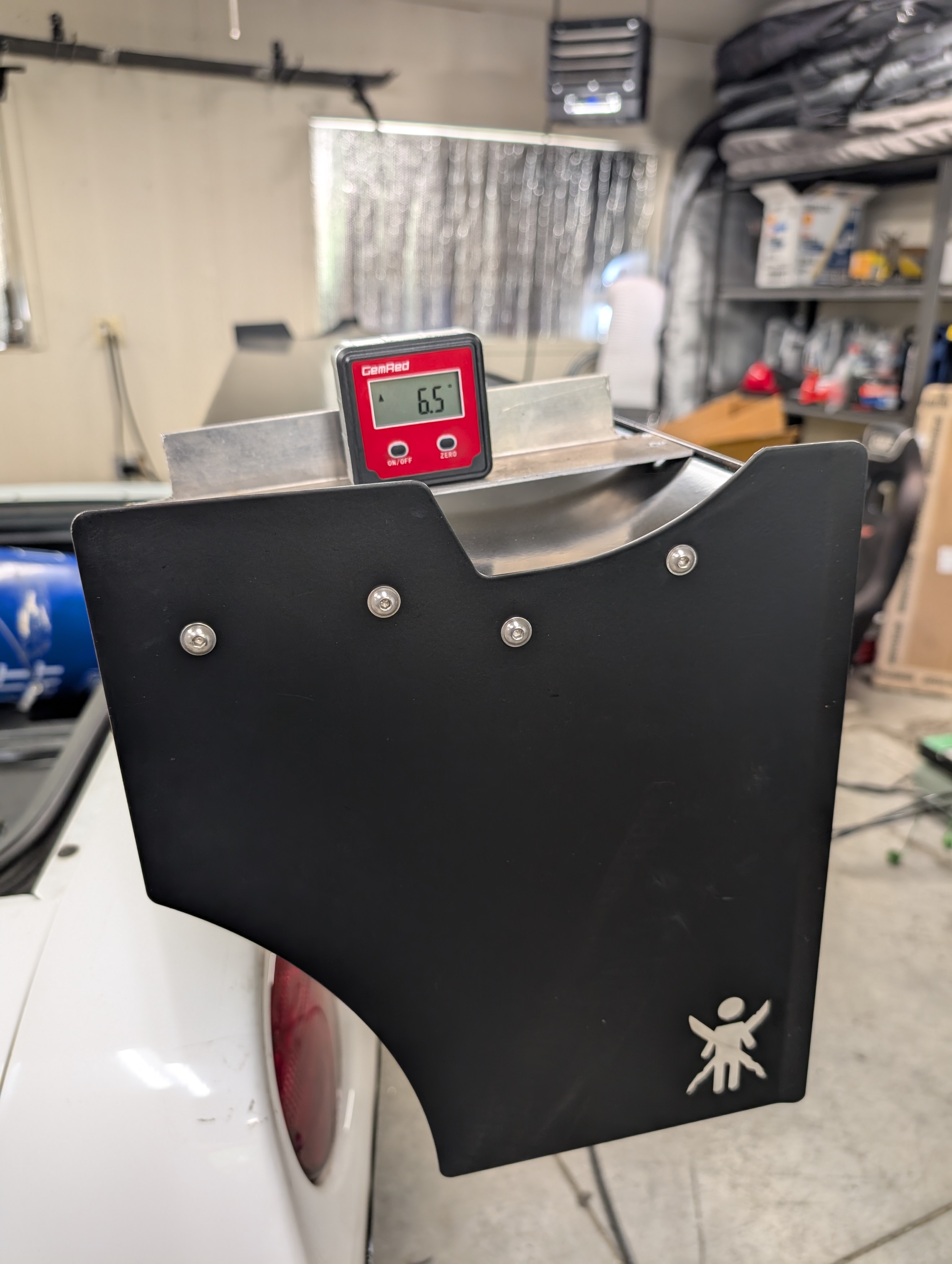 An angle meter on a 9 Lives Racing Wing on a C5 Corvette showing 6.5 degrees of angle.