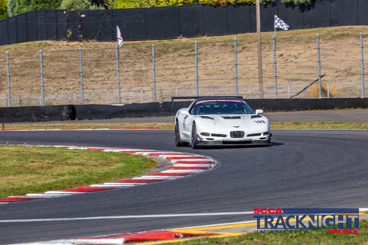 Shred Jesse's Corvette taking turn 13 at PIR