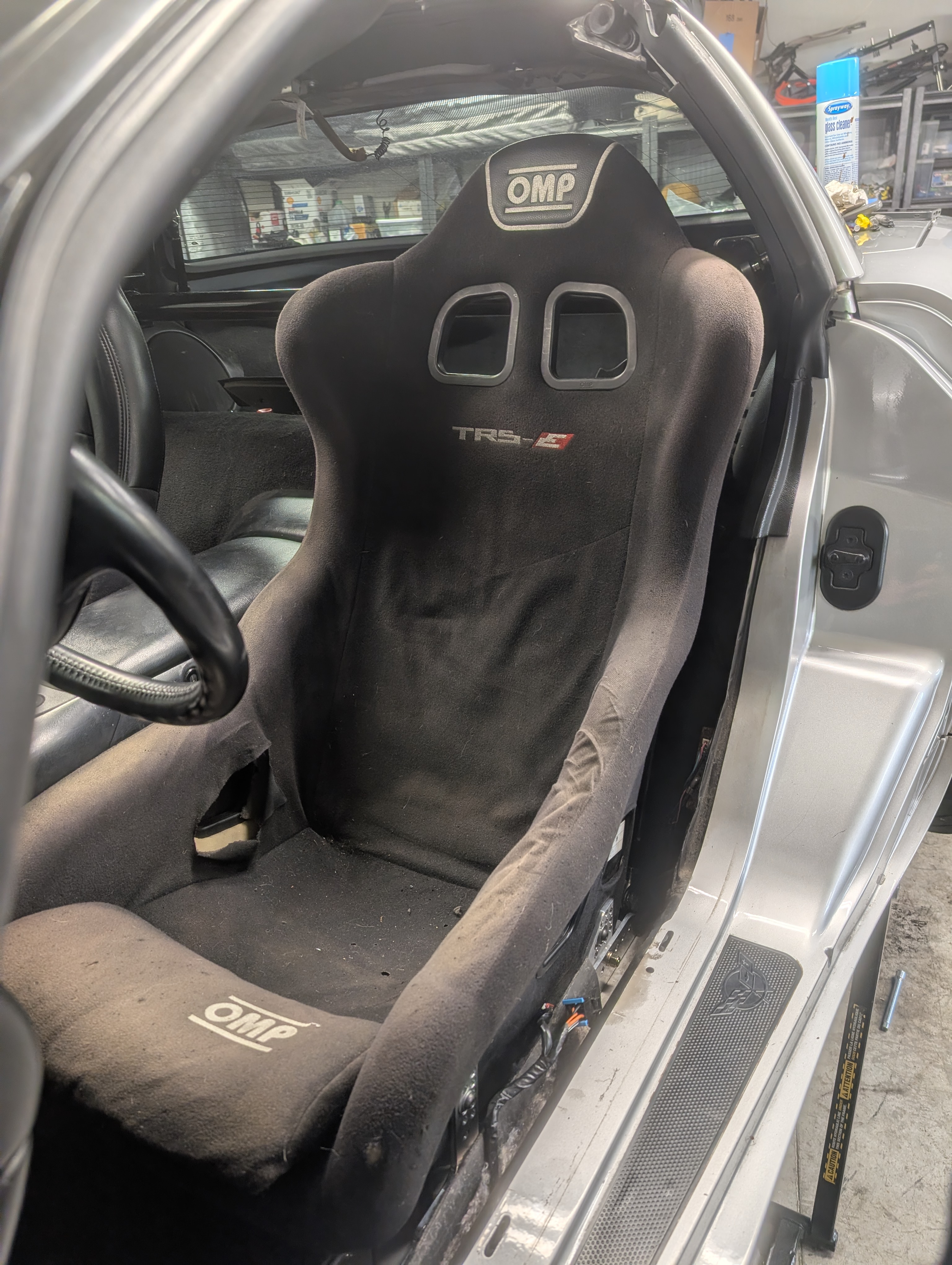 A rather beat up OMP TRS-E XL seat in the Dead to Shred C5 Corvette.