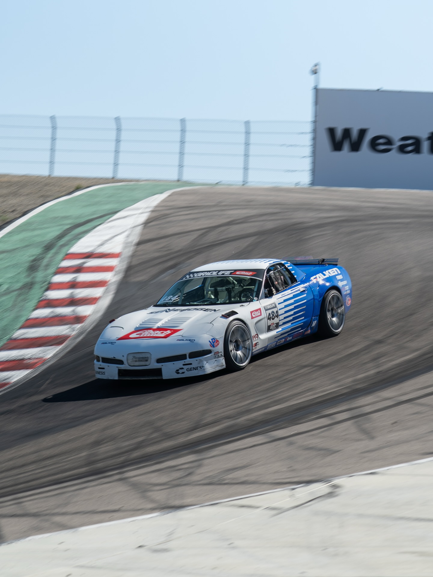 C5 Corvette going through the Laguna Seca Corkscrew