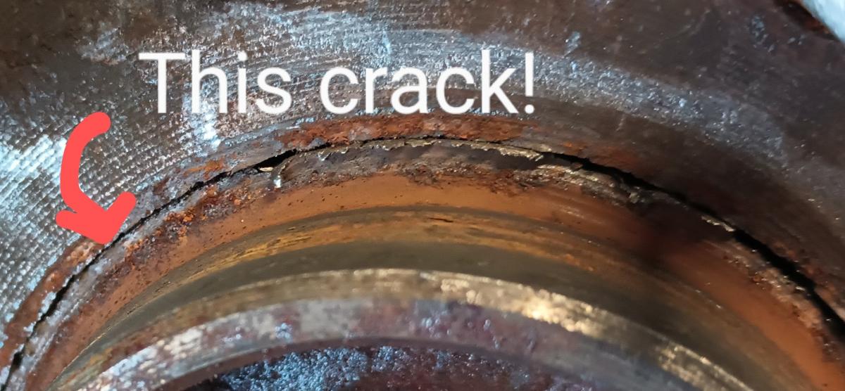 A picture of the OEM C5 Corvette wheel hub, with a major crack running the inner diameter of the face. This was a near catastrophic failure on a C5 Corvette.