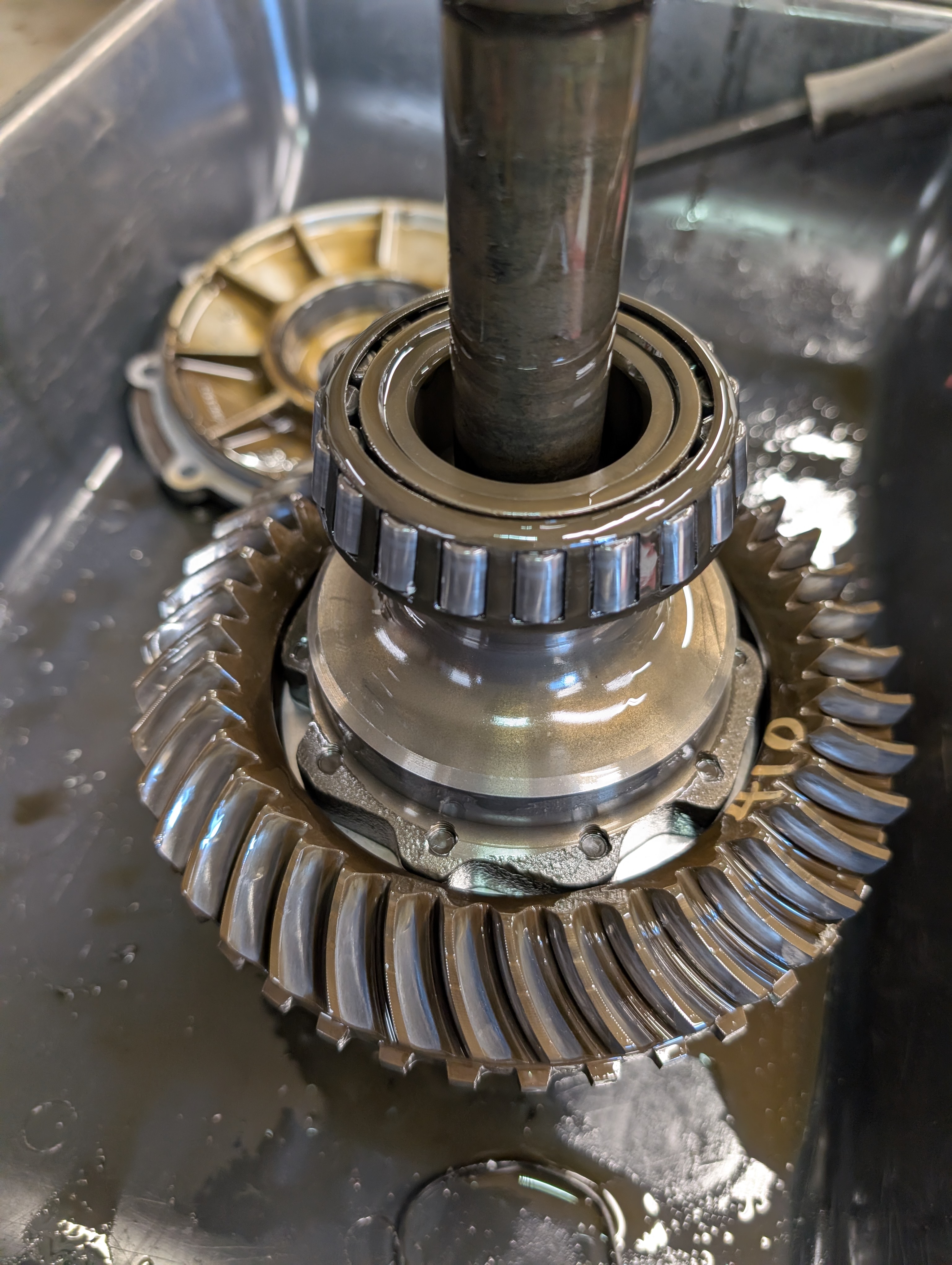 A C5 Corvette ring gear carrier in a tub, with the very large bearings and ring gear prominently featured