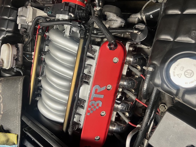 The engine bay of Brian's C5 corvette, showing off beautiful polished hdears and BTR valve covers