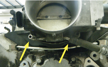 C5 Corvette Throttle Body picture highlight where coolant runs through it.