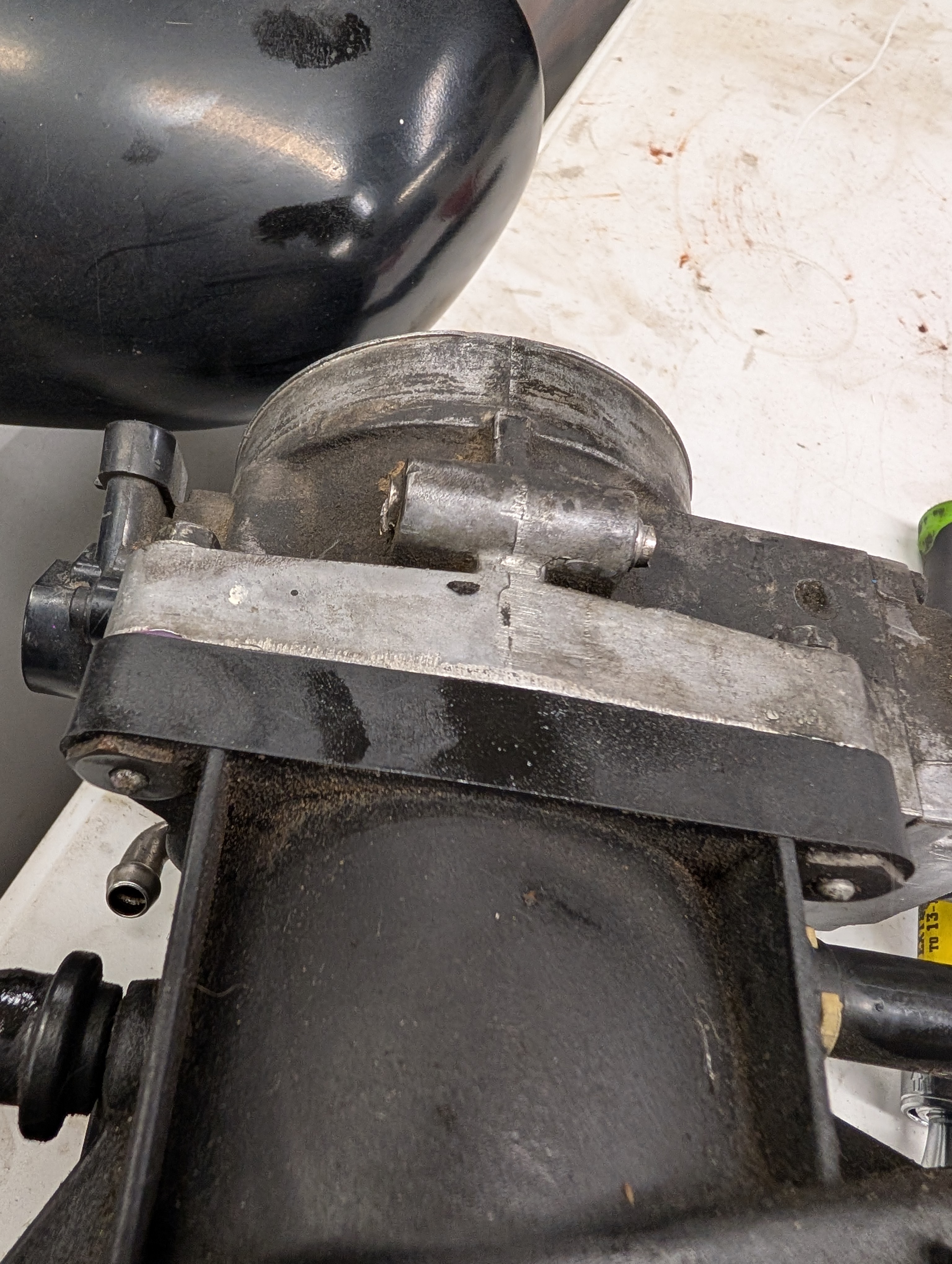 A C5 Corvette throttle body, where the coolant crossover connection was cut off.