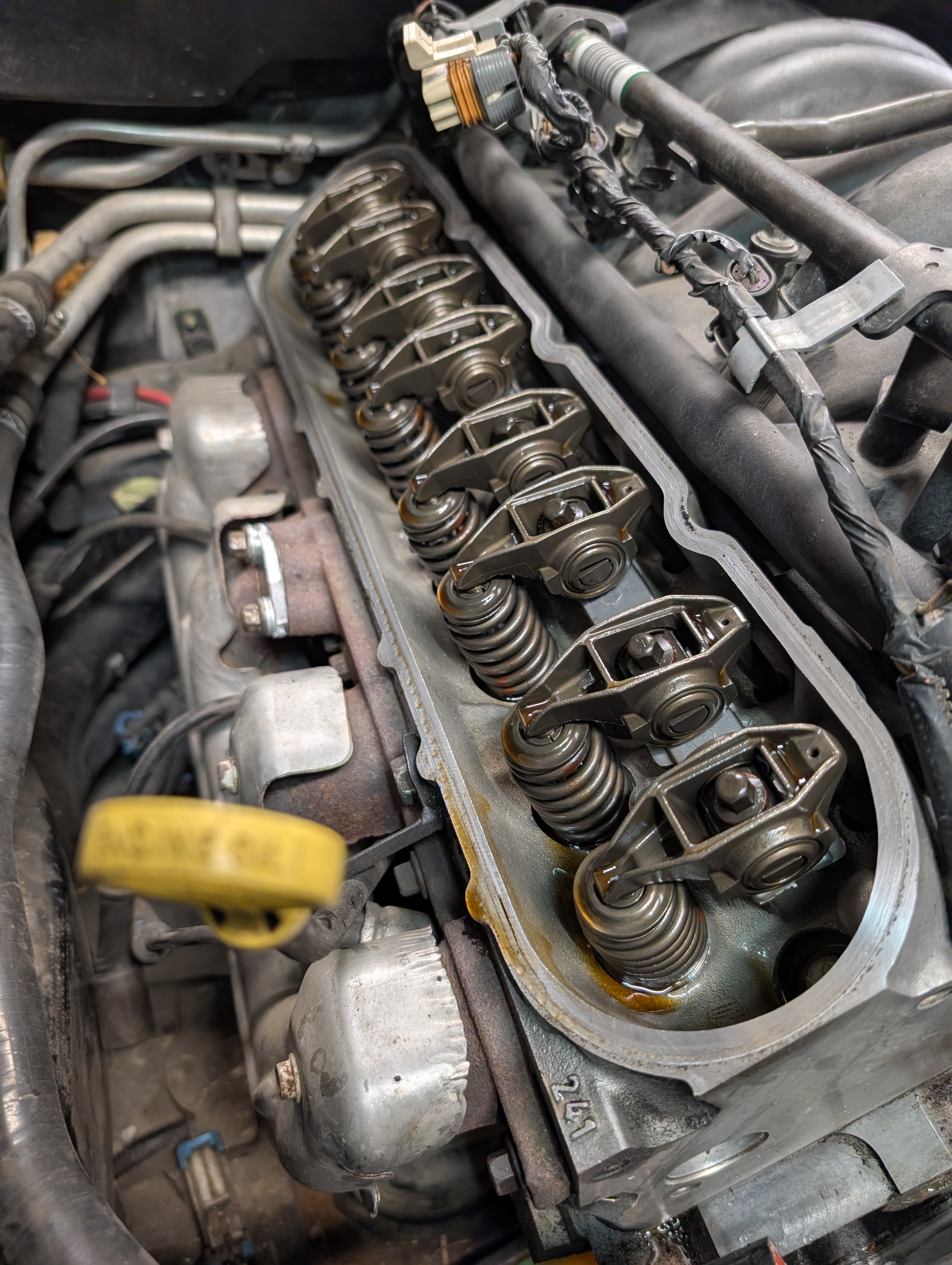 The passenger side valve train below the valve cover on a C5 Corvette LS1