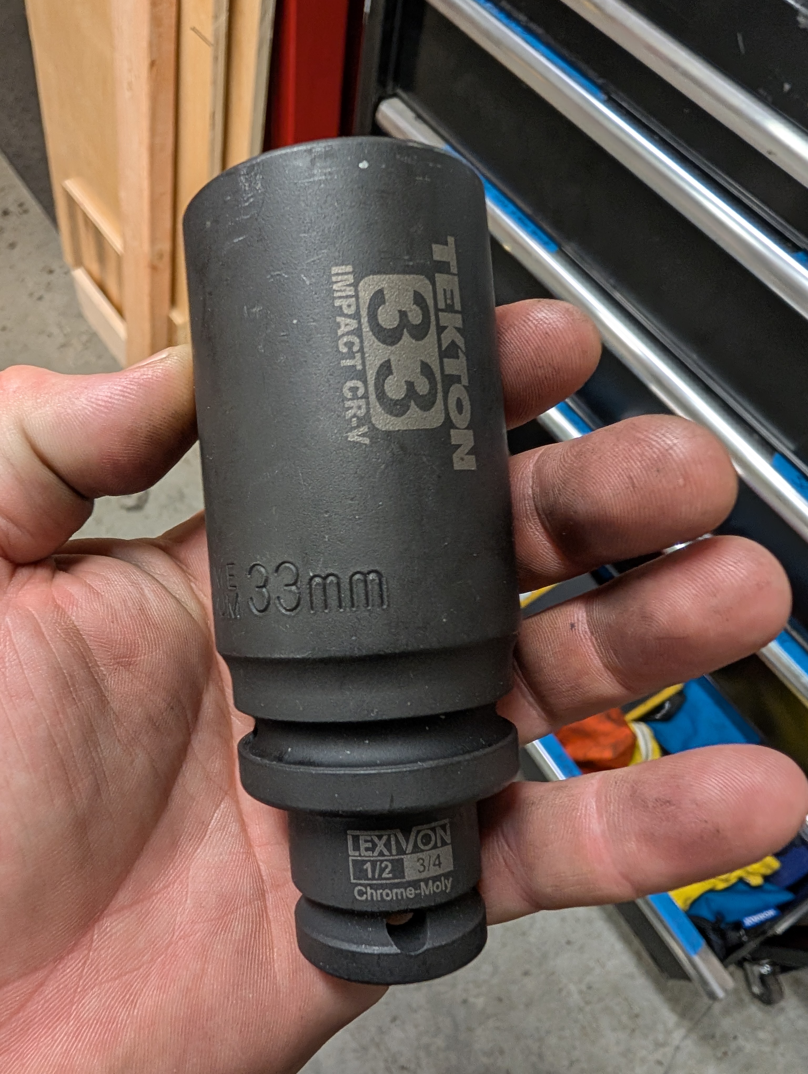 An example of a 33mm socket needed for a C5 Corvette axle nut, along with the necessary adapters to work with a ratchet.