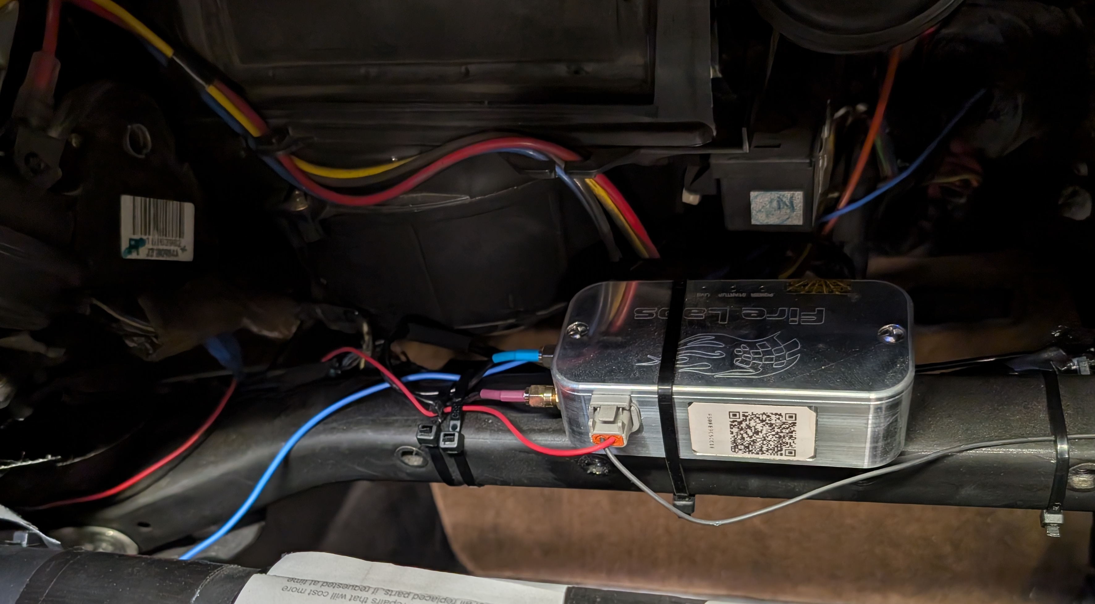 Fire Laps unit mounted in the dash / passenger airbig area of Shred Jesse's C5 Corvette