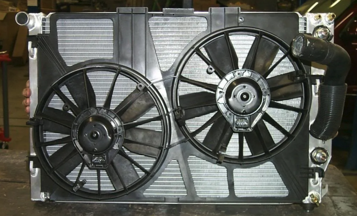 A C5 Corvette Radiator that was "skeletonized", as in non essential flat sections were cut out in an effort to improve airflow.