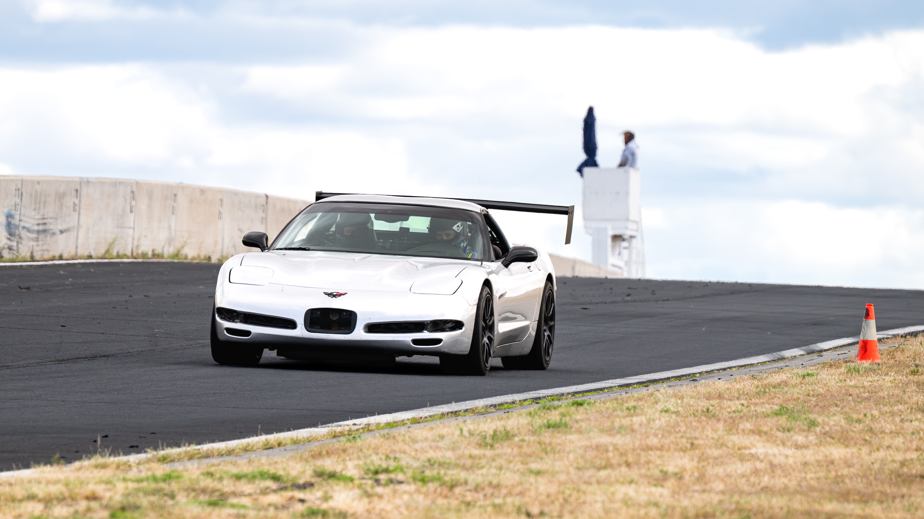 Shred Jesse driving the Dead to Shred Grey 2001 C5 Corvette, entering the first turn when running CCW at ORP