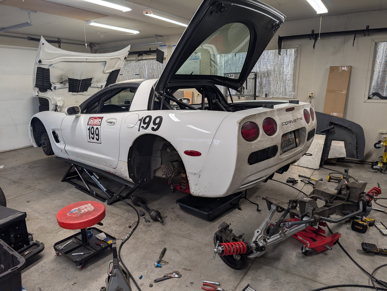 A C5 Corvette on Quickjacks with the Rear Subframe removed.