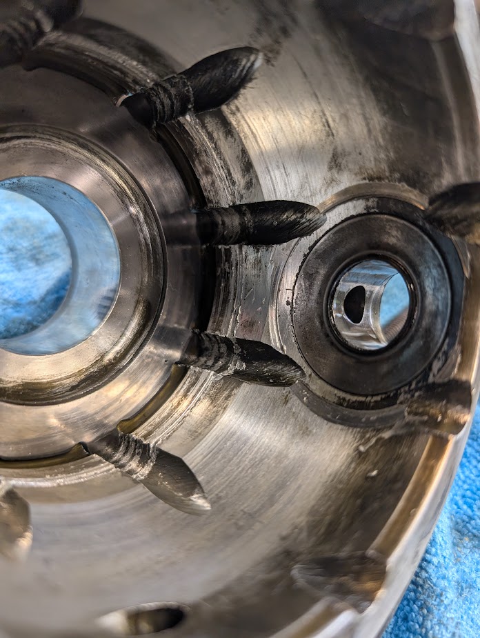 The inside of a C5 Corvette differential carrier, where the clutch pack would normally go. The walls have radial gouges throughout.