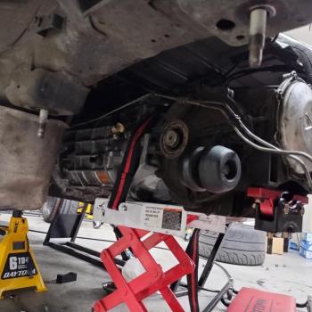 A C5 Corvette rear transmission and differntial in a C5 Corvette with the rear axles and subframe removed.