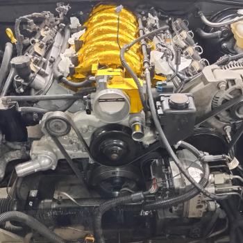 An LS1 Engine pictured with a custom steam port Crossover setup