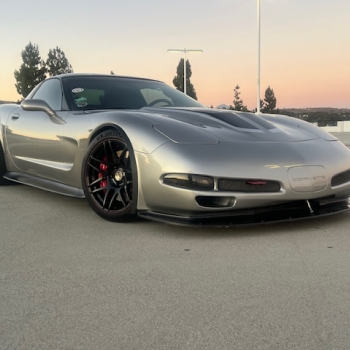 A hero shot of Brian Stephen's 300k+ mile grey and black c5 corvette